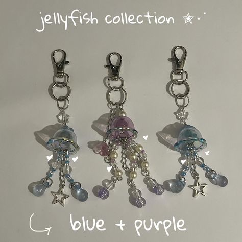 jellyfish collection is popular right now! :3 ✨ [#bead #beads #beadsjewelry #jellyfish #jellyfishkeychain #keychain #handmadekeychain #handmadejewelry #handmadegifts #handmadejewelry #handmadewithlove #etsyshop #phonecharms #customphonecharm #beadedkeychain #handmadeaccessories #handmadecraft] Jellyfish Beads, Beaded Jellyfish, Jellyfish Keychain, Purple Jellyfish, Earring Inspo, Beaded Keychains, Custom Phone, Handmade Accessories, Jellyfish