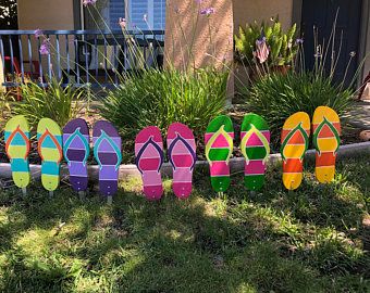 Yard art | Etsy Pool Signs Diy, Wooden Yard Art, Fan Blade Art, Background Stripes, Flip Flop Art, Flip Flop Sign, Yard Art Crafts, Poolside Decor, Lifeguard Chair