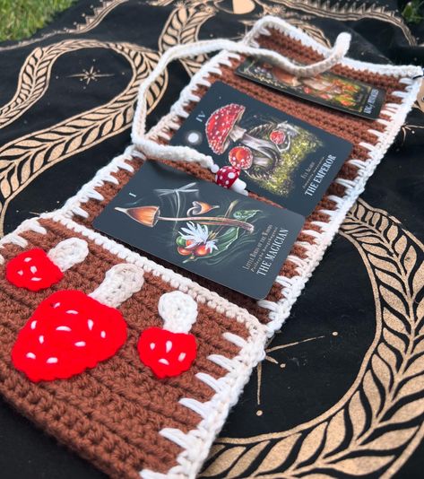 Check out these amazing crocheted tarot deck cases! Perfect for protecting your deck and perfect for presenting a reading! We have an entire page dedicated to them right here ➡️ https://megan-and-meg-nail-designs.square.site/shop/tarot-deck-holders/PZ3BNNPWFZOVTT6JGTC5RXOJ Help support Far North Craft’s journey back to Alaska by buying some of her beautiful crotched pieces, every purchase helps! Tarot Holder Crochet, Crochet Deck Holder, Crochet Tarot Mat, Crochet Tarot, Yarn Diy, Needle Work, Tarot Deck, Tarot Decks, Creative Projects