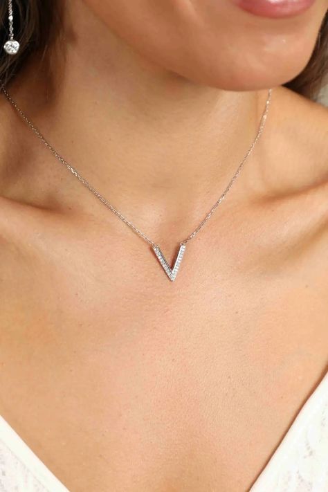 Showcase your personality with LOVCIA Adored Sterling Silver V Letter Pendant Necklace. 🌟Unique pendants for every style at LOVCIA. Shop https://lovcia.com/products/lovcia-adored-sterling-silver-v-letter-pendant-necklace-ltr24101300278574731 . #Lovcia #LovciaJewelry #GiftsForWomen #PendantNecklaces #Necklaces #NecklacesForWomen #Women'sNecklaces #PersonalStyle #Pendants #JewelryForWomen #JewelryForGirls #GiftForHer #GiftForLove #LatestPendantStyle #PendantJewelry V Letter, V Necklace, Letter Pendant Necklace, Outfit Making, Letter Pendants, Unique Pendant, Necklace Silver, Rhodium Plated, Silver Necklaces