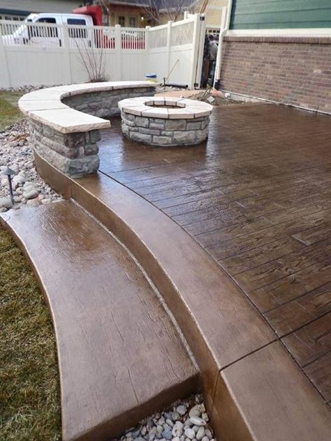 Stamped Concrete Patio Ideas With Fire Pit, Raised Stamped Concrete Patio, Stamped Concrete Patio Ideas Wood Plank, Brown Concrete Patio, Raised Concrete Deck, Wood Stamped Concrete Patio, Slate Stamped Concrete Patio, Patio With Wall, Stamped Concrete Patio Ideas