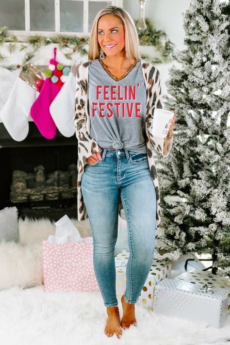 Get in the holiday spirit in new holiday graphic tees! Open presents, look at Christmas lights, sit by the fire, go Black Friday shopping, this shirt will be your go-to all holiday season long! #holidaygraphictees #Christmasoutfit #womensholidayoutfit #holidayparty Holiday Graphic Tees, Boutique Inspiration, Gameday Couture, Post Holiday, All Christmas, Nfl Outfits, Christmas Pjs, V Neck Top, Cool Graphic Tees