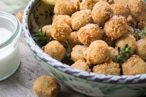 Pioneer Woman Fried Olives are a simple yet sophisticated appetizer made by coating olives in a crispy breadcrumb mixture Fried Olives Recipe, Zucchini Fried, Mushrooms Fried, Fried Olives, The View From Great Island, Fried Zucchini, Shrimp Rolls, Plum Sauce, 5 O Clock Somewhere