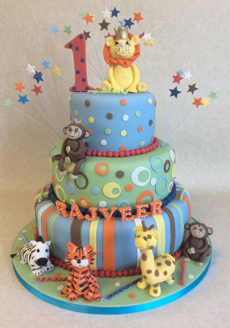 A real wow factor in this cake with lots of bright colours and jungle animals for Rajveer's big celebration 3 Rd Birthday Cake, Boys Theme Cake, Jungle Party Cake, 3 Rd Birthday, Zoo Birthday Cake, 3 Tier Birthday Cake, Tier Birthday Cake, Jungle Theme Cakes, Small Birthday Cakes