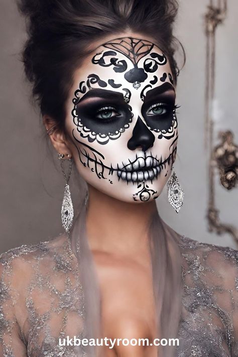 Sugar skull makeup is a colorful and artistic face painting style inspired by the Mexican holiday, Día de los Muertos (Day of the Dead). It involves using bright colors, white and black paint to create designs on the face that resemble ornate sugar skulls. This post list 17 pretty sugar skull makeup ideas you can create at home. easy, pretty, tutorial, easy simple, for men, half, kids easy, DIY, for men with beards, half face, step by step Skull Faces Halloween, Easy Half Face Halloween Makeup, Face Paint For Women Halloween, Witch Doctor Face Paint, Jeweled Skull Makeup, Women’s Halloween Face Paint Ideas, Dawn Of The Dead Makeup, Katrina Face Painting, Sugar Skull Makeup Ideas