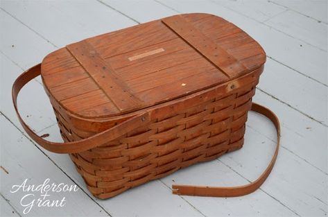 What can you do with a picnic basket that has a broken handle? Why not turn it into a great decorative storage basket like this one? It's a simple DIY project you can do in an afternoon! Refurbished Baskets, Vintage Picnic Basket Display, Vintage Picnic Basket Decor, Wicker Basket Makeover, Picnic Basket Decor, Pinic Basket, Antique Picnic Basket, Longaberger Basket Ideas, Upcycled Decor