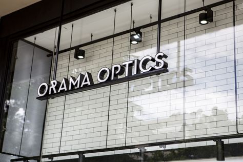 Sunglasses and eyewear store @oramaoptics Store Signage Design, Store Front Signage, Japandi Office Design, Mall Signage, Hanging Signage, Ballroom Design, Monument Signage, Corporate Signs, Entrance Signage