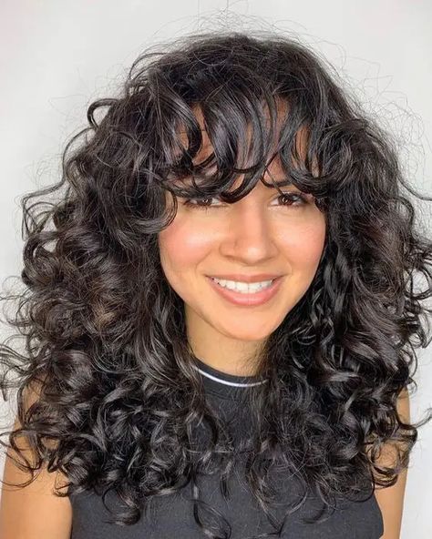 19 Curly Hair Bangs Styles for Every Face Shape - Get Inspired Now Curly Hair Celebrities, Blonde Curly Bob, Messy Blonde Hair, Perfect Curly Hair, Waterfall Hairstyle, Curly Pixie Hairstyles, Face Framing Bangs, Nancy Sinatra, Curly Bangs