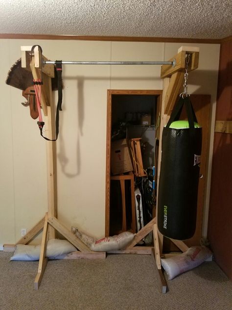 Pull up bar with heavy weight bag holder. Home Gym With Punching Bag, Punching Bag Stand Diy Wood, Punching Bag Home Gym, Diy Punching Bag Stand, Boxing Bag Hanging Ideas, Diy Boxing Bag Stand, Punching Bag Stand, Boxing Bag Stand, Heavy Bag Stand