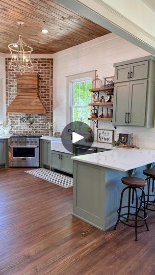 1.5K views · 849 reactions | 𝙼𝚢 𝙺𝚒𝚝𝚌𝚑𝚎𝚗: 𝚃𝙾𝙿 𝟻

There are so many other things to list, but here are the top five things that I absolutely love about my kitchen!

1. Open concept 
2. Open shelves
3. Frigidaire Professional refrigerator & freezer
4. 33” farmhouse sink
5. Custom cabinets

The question I get asked the MOST is what is the paint color of my kitchen cabinets. The paint color is a HGTV Sherwin-Williams color: Meadow Sage. It is not on any of the paint swatches, but if you ask for it, they can make it for you! It is the perfect sage color. Not too green, not too blue, not too gray!

#kitchen #kitchendesign #kitchendecor #kitchenrenovation #kitchenremodel #kitchenreno #kitchencabinets #customkitchen #kitchenappliances #farmhousesink #stainlesssteelkitchen #stainlessste Sherwin Williams Meadow Sage, Gray Green Kitchen Cabinets, Frigidaire Professional Refrigerator, Bungalow Remodel, Meadow Sage, Sage Kitchen, Frigidaire Professional, Kitchen Top, Sage Green Kitchen