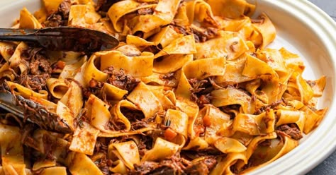 Short Ribs with Pappardelle - The Best Ragu Ever - Sip and Feast Short Rib Ragu, Sip And Feast, Italian Meat Sauce, Lamb Ragu, Parmesan Rind, Sunday Dinner Recipes, Italian Meats, Sausage Recipe, Short Rib