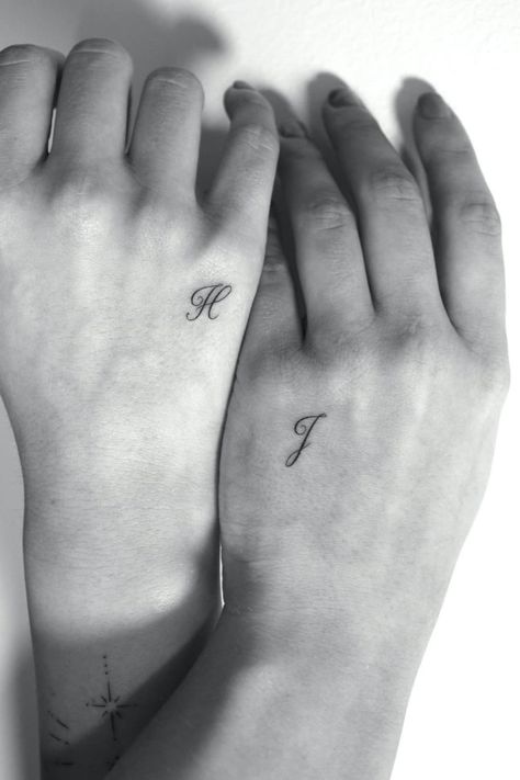 36 Best Small Hand Tattoo Ideas Hand Tattoos Words, Couples Hand Tattoos, Tattoos Words, H Tattoo, Hand And Finger Tattoos, Petite Tattoos, Small Hand Tattoos, Discreet Tattoos, Dainty Tattoos