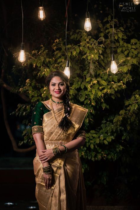 Photo of Bride wearing a gold saree with a bottle green blouse. Bottle Green Blouse, Green Velvet Blouse, Gold Saree Blouse, Bottle Green Saree, Green Blouse Designs, Photo Of Bride, Gold Saree, Indian Bride Makeup, Bengali Bridal Makeup