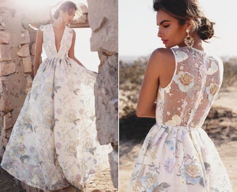 A stylish floral printed gown from Lurelly Wedding Dresses With Pop Of Color, Convalidation Ceremony Dress, Cherry Blossom Gown, Wedding Dress With Blue Flowers, Wild Flower Wedding Dress, Nontraditional Wedding Dress Color, Floral Wedding Dress Colored, Wildflower Wedding Dress, Fun Wedding Dresses