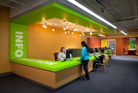 Circulation desk with bold graphics. [Wight & Company... visit us at wightco.com] Pediatric Waiting Room Ideas, Children Hospital Design, Circulation Desk, Front Desk Design, School Reception, School Office Decor, Kindergarten Interior, Library Desk, Classroom Interior