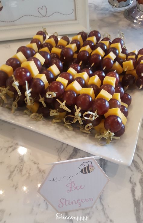 Bee Inspired Party Food, Bee Stingers Fruit, Bee Bridal Shower Theme Food, Bridal Shower Honey Bee Theme, First Bee Day Party Food Ideas, What Will It Bee Gender Reveal Food, Honey Bee Baby Shower Food Ideas, Bee Themed Brunch, Bee Theme Food Ideas