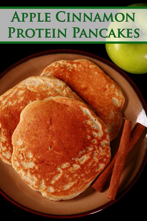 3 apple cinnamon protein pancakes on a plate, with 2 cinnamon sticks.  Green text says apple cinnamon protein pancakes. Apple Protein Pancakes, Apple Cinnamon Pancakes Healthy, Pumpkin Protein Powder Pancakes, Apple Cinnamon Protein Pancakes, Cinnamon Protein Pancakes, Pumpkin Protein Pancakes Low Carb, Food Preps, Gluten Free Protein Pancakes, Autumn Bates Protein Pancakes