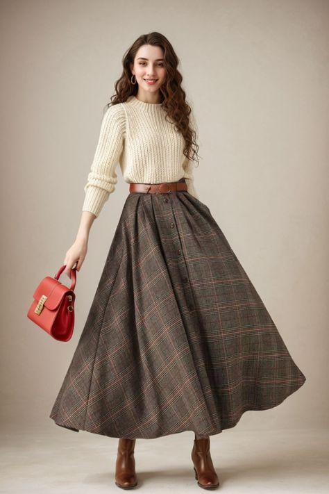 This winter wool skirt is a classic piece of tailoring that will see you through rain or shine. It is cut with a flattering flared skirt to give you a wonderful shape. The winter skirt is perfect classic styling and ends at the ankle. This is a versatile skirt that you'll wear again and again. DETAILS: * 30% wool, 30% fiber, 40% polyester * fully satiny liner * Two side pockets * Buttons closure * has belt loops to keep everything in place  * Plus size full skirt * Ankle length skirt * Perfect for Winter, autumn MODEL SIZE Bust 85 cm(33.4") Waist 67 cm(26.7") Height 168cm (5' 6") She wears size XS SIZE GUIDE Size vary between Brand and Country Please get your body measurement with our Size Guide And Find your size in our Size Chart Size Guide https://etsy.me/3d3EmoM SIZE CHART  https://ets Classic Winter Outfits Classy, Wool Long Skirt, Womens Winter Skirt Outfits, Vintage Inspired Outfits Casual, Winter Wardrobe Aesthetic, Denim Flare Skirt Outfit, Autumn Long Skirt Outfit, What To Wear With Long Skirts, Korean Style Dress Elegant