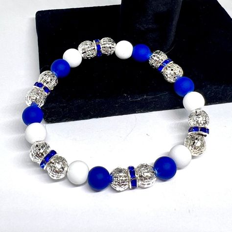 Experience awesomeness! Introducing Dallas Cowboy Football Bead Bracelets - Handcrafted Fan Accessories, available now at an amazing price of $10.00 #SportsJewelry #DallasCowboys #AcrylicBeads #StretchyBeads #SilverFiligreeBead #PolymerClayBeads #TeamSpirit #BlueWhiteSilver #TexasBracelets #FashionJewelry Cowboy Football, Dallas Cowboy, Sports Jewelry, Dallas Cowboys Football, Cowboys Football, Fan Accessories, Bead Bracelets, Polymer Clay Beads, Silver Filigree