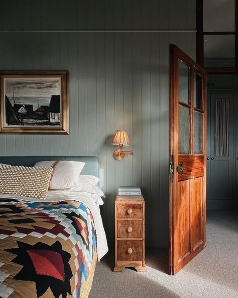 Scandinavian Bedroom Nordic, Nicky Kehoe Bedroom, Ochre Bedding, Panelled Bedroom, Edwarian Bedroom Lights, Grey Paint Schemes, Internal Window, Ochre Linen Bedding, Orange Door