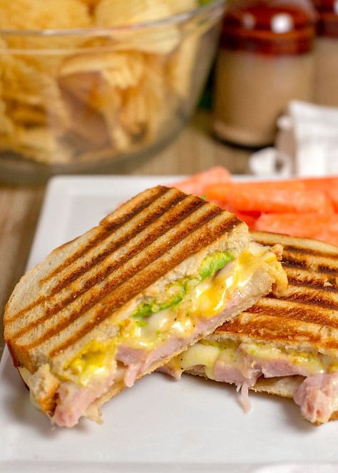 A Ham and Cheese Panini is crispy, cheesy and a delicious a way to use up your ham leftovers. Paninis are quick to make and everyone will love them! Ham Panini Recipes, Leftover Ham Ideas, Ham And Cheese Panini, Ham Panini, Recipes With Hawaiian Rolls, Sandwich Recipes Panini, Ham Sandwich Recipes, Ham Ideas, Ham Leftovers