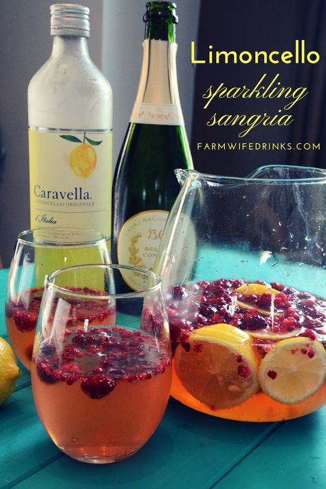 Limoncello Sparkling Sangria - The Farmwife Drinks Limoncello Sangria Recipe, Lemon Cello Recipe, Lemon Sangria, Limoncello Drinks, Sangria Party, Sparkling Sangria, White Sangria Recipe, Rose Sangria, Frozen Raspberries