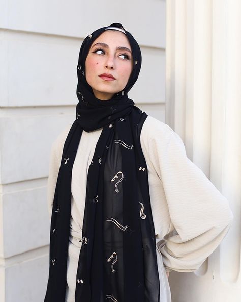 Badr – Our new soft chiffon scarf in black for an elegant look with its touch of minimalistic charm and history with an arabic letter calligraphy intricate detailing. #JudeOfficial #RevivingModesty #hijab #hijabfashion #hijabstyle #hijabscarf #hijabinspiration #hijabdaily #hijabfashioninspiration #hijabcasual #hijabscarfstyle #headscarf #hijabstyleinspo #hijabfashionstyle #modestwear #muslimstyle #muslimfashion #arabfashion #embroideredscarf #trendyhijab #chichijab #eleganthijab #ootdhijab Letter Calligraphy, Hijab Designs, Muslim Style, Embroidered Scarf, Hijab Scarf, Arab Fashion, Hijab Fashion Inspiration, Modest Wear, Black Scarf