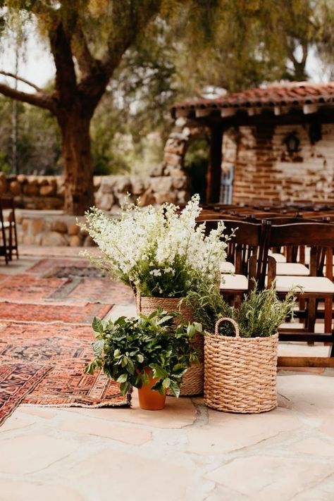 Budget Wedding Floral Ideas, Wedding Ceremony Potted Plants, Potted Plant Ceremony Decor, Basket Flower Wedding, Potted Plant Wedding Aisle, Potted Plants At Wedding, Potted Plants Wedding Alter, Church Wedding Alter Flowers, Flowers In Baskets Wedding