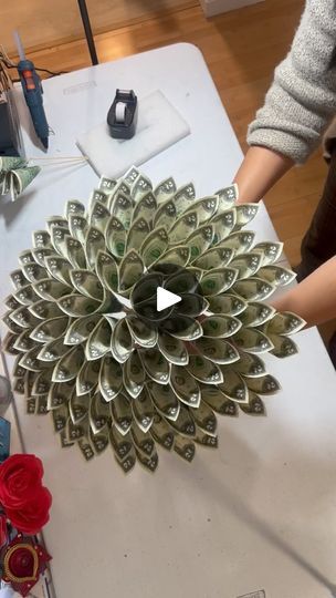 1.1M views · 36K reactions | Luckily I have enough time to record this arranging step of this bouquet 😅 #kkhouse #moneybouquet #moneybouquetbykkhouse #tutorial #bouquet #bayarea #holidays #giftideas | 💐Money Flowers and beyond | thebrandonisaiah · DJ SUAVE x MakeItDoubleBack. How To Make Money Roses, Money Flower Bouquet Dollar Bills, How To Make A Money Bouquet Tutorials, Money Bouquet Diy Dollar Bills, How To Make Money Flower Bouquet, How To Make Money Bouquet, Senior Leis, Money Bouquet For Men, How To Make A Money Bouquet