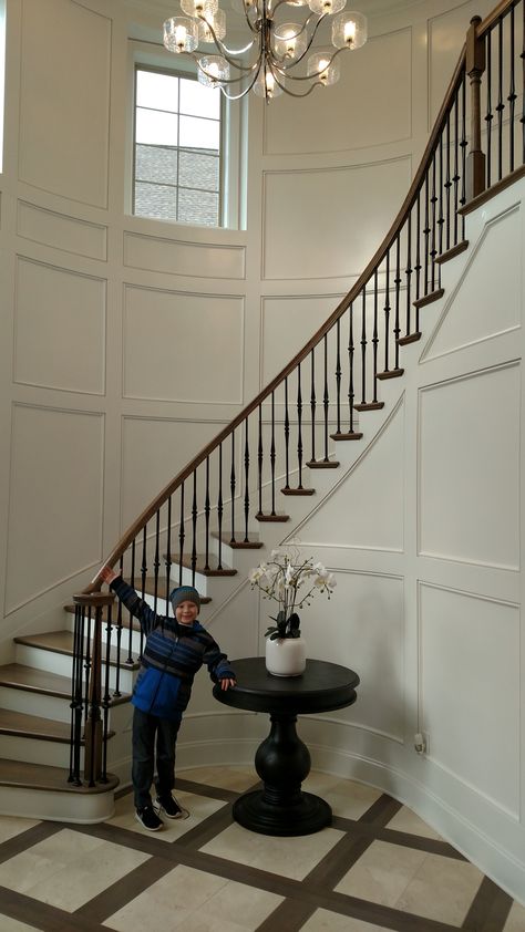 Wainscoting On Curved Staircase, Curved Staircase Molding, Wainscoting Curved Stairs, Decorating Curved Staircase Wall, Half Spiral Staircase, Curved Stairs Entryway, Curved Wall Paneling, Curved Wainscoting, Curved Staircase Wall Decor