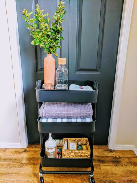 Ikea Raskog cart for the guest bedroom Ikea Cart Living Room, Trolley Cart Ideas Bedroom, Guest Bathroom Cart, Bathroom Trolley Ideas, Guest Bedroom Cart, Bathroom Cart Decor, Guest Room Cart, Storage Cart Ideas Bedroom, Bathroom Cart Organization