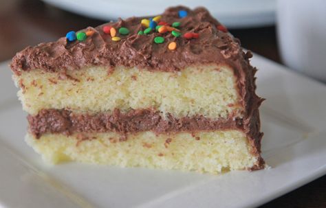 Fluffy, Moist Homemade Yellow Cake Recipe | Divas Can Cook.  Bet this would make a great funfetti cake, too. Scratch Yellow Cake Recipe, Yellow Cake From Scratch, Homemade Yellow Cake, Chocolate Buttercream Frosting Recipe, Moist Yellow Cakes, Divas Can Cook, Yellow Cake Recipe, Slice Of Cake, Chocolate Buttercream Frosting