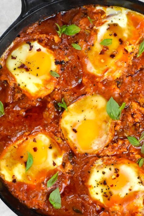 My easy Eggs in Purgatory is like a spicy Italian version of Shakshuka, and gets a flavor boost from hearty sausage. Easy Shakshuka Recipe, Easy Shakshuka, Breakfast Ideas Healthy Clean Eating, Eggs In Purgatory, Shakshuka Recipe, Great Breakfast Ideas, Shakshuka Recipes, Sausage Dishes, Spicy Tomato Sauce