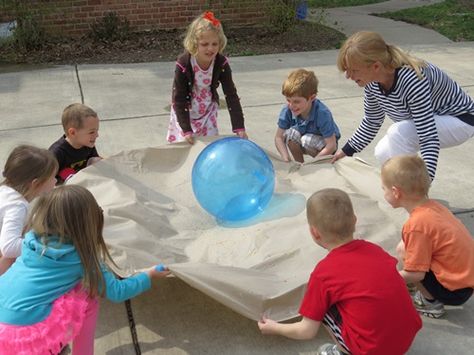 Five simple activities that promote teamwork! | Teach Preschool Earth Day Large Motor Activities, Around The World Gross Motor Activities, Earth Day Physical Activities, Earth Day Movement Activities, Earth Day Music And Movement, Earth Day Gross Motor Activities, Sport Day Activities, Earth Day Games, Teamwork Activities