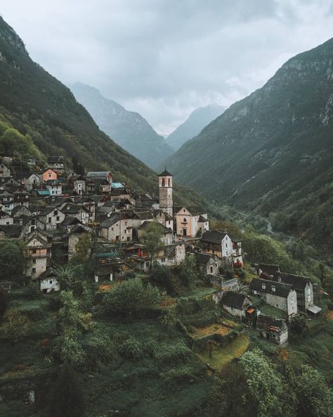 An old village found in the Swiss Alps. Village In Mountains, Mountain Side Village, Village On Mountain, Village Mountain, European Mountains, Village From Above, Medieval Mountain Village, The Swiss Alps, Medevil Village Aesthetic