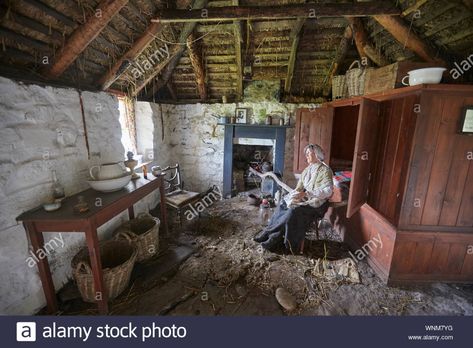 Inside Sheila's cottage museum a traditional Scottish black house on the Isle of Ulva, Isle of Mull, Inner Hebrides, Scotland, UK Stock Photo Traditional Irish Cottage Interiors, Irish Cottage Interiors, Scottish Croft, Sitting By The Fire, Scottish Cottages, Hebrides Scotland, Black Houses, Backyard Seating Area, Stone Cottages