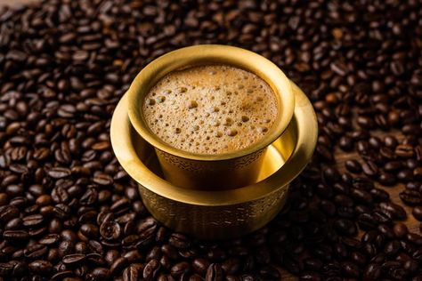 South Indian Filter coffee served in a traditional brass or stainless steel cup Types Of Coffee Beans, Indian Coffee, Vietnamese Iced Coffee, Cuban Coffee, Ethiopian Coffee, Chicory Coffee, Brazilian Coffee, Coffee Ingredients, Coffee History