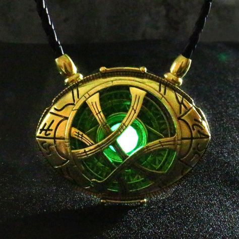 Eye+of+Agamotto+(Doctor+Strange)+by+Remanater. Eye Of Agamotto, Marvel Jewelry, Cape Outfit, Time Stone, Marvel Coloring, Cosplay Jewelry, Glow In Dark, Dr Strange, Movie Costumes