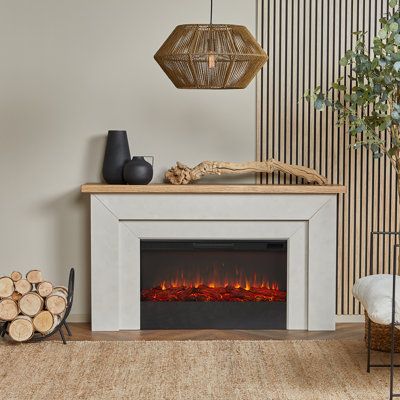 Brighten up your home or office with the fresh, contemporary style of the Malie electric fireplace. Part of the Real Flame® VividFlame Landscape Series, the widescreen electric firebox mimics the look of a real, flickering fire, but does not require a chimney or vents and conveniently plugs into a standard outlet. This free-standing, extra-long indoor fireplace has a mantel with a real wood finish and features six flame colors, five flame brightness levels, an adjustable thermostat, a timer func Electric Fireplace With Mantel, Indoor Electric Fireplace, Flame Colors, Mantel Surround, Electric Fireplaces, Electric Fireplace Tv Stand, Freestanding Fireplace, Electric Fireplace Insert, Real Flame