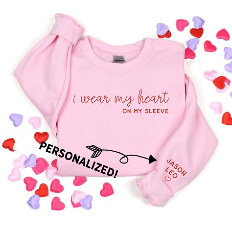 "This listing includes ONE shirt.  If you would like multiple, coordinated tees, please add each to your cart seperately with your size/color choice. Choose from: - Pink sweatshirt with  \"I Wear my Heart on my sleeve\", personalized with kid's names - White long sleeve tshirt with  \"I Wear my Heart on my sleeve\", personalized with kid's names - Kids Red long sleeve tshirt with \"Mama's Heart\" on it - Baby red long sleeve bodysuit with \"Mama's Heart\" on it  Details  - Front graphic is a Scr Diy Valentine's Shirts, Valentine Shirts Vinyl, Red Long Sleeve Bodysuit, White Long Sleeve Tshirt, Kids Valentines Shirts, Heart On My Sleeve, Valentines For Mom, Baby Red, Cute Shirt Designs