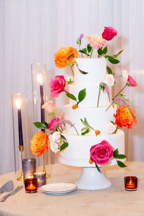 Hot pinkn rose, orange rose, peach rose, pink veronica, blush spray rose floral wedding cake Wedding Cake Pink And Orange, Orange And Pink Wedding Cake, Pink Orange Wedding Cake, Sunset Wedding Cake, Pink Veronica, Orange Wedding Cake, Wedding Cake Peach, Engagement Party Cake, Orange And Pink Wedding