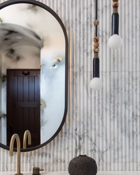 Artistic Tile’s Instagram post: “The deep, triangular flutes of Pinnacle Calacatta Gold add intriguing detail to this modern bath designed by @kinteriors_sf. Photo:…” Disco Hair, San Francisco Interiors, Watermark Design, Artistic Tile, Modern Baths, Wall Molding, Marble Wall, Bath Design, Beautiful Bathrooms