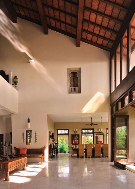 Decorating interiors with high ceilings implies a high dose of creativity. #RoomStyle Chettinad House, Kerala Traditional House, Scarlet Macaw, Best Modern House Design, Indian Home Design, Indian Home Interior, Kerala House Design, Kerala Houses, Casas Coloniales