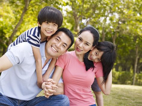 Outdoor portrait of happy asian family. Asian family with two children taking a , #affiliate, #asian, #family, #happy, #Outdoor, #portrait #ad Asian Family, Family Stock Photo, Photography Poses Family, Baby Bath Time, First Time Parents, Outdoor Portraits, Family Illustration, Parenting Books, Parenting Guide