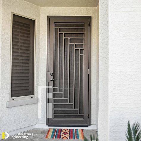 Amazing Metal Door Ideas To Added For Your Home | Engineering Discoveries Safety Gates For Front Door, Grill Door Design Front Entry House, Iron Grill Door Design Front Entry, Iron Get Door, Entrance Grill Door Design, Burglar Door Designs, Front Iron Door, Grill For Door Design, Iron Safety Door Design Entrance