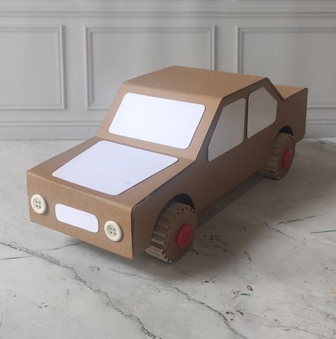 Cardboard craft Cardboard Car Ideas, Car Made Out Of Cardboard Boxes, How To Make A Cardboard Box Car, Surprise Auto, Cardboard Car Diy, Car Out Of Cardboard, Diy Cardboard Car, Car From Cardboard, Car Cardboard