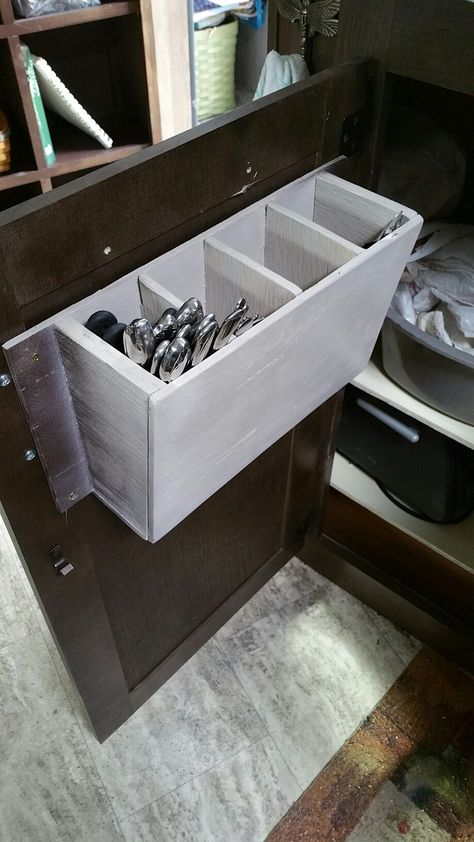 Nice trailer but no silverware drawer?  Nice solution, utensil bins installed on cabinet door. No Drawer Silverware Storage, No Silverware Drawer, Utensil Storage In Cabinet, No Kitchen Drawers, Organized Silverware Drawer, Silverware On Countertop, Storing Silverware Without Drawers, No Kitchen Drawers Utensil Storage, Countertop Silverware Storage Ideas