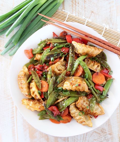 Chicken Potsticker Stir Fry Recipe - WhitneyBond.com Pot Sticker Stir Fry Recipe, Potsticker Stir Fry Recipe, Potsticker Stir Fry, Simple Stir Fry Sauce, Chicken Potstickers, Simple Stir Fry, Chinese Meals, Potstickers Recipe, Stir Fry Sauce Easy