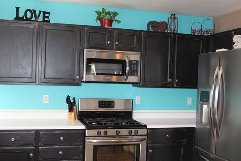 DYI my new kitchen remodel.  Turquise, red and black!! I love it my Husband not so sure. Black And Teal Kitchen Ideas, Black Kitchen Decor, Turquoise Kitchen, Turquoise Walls, Teal Kitchen, Rental Kitchen, Apartment Stuff, Turquoise Grey, Black Cabinets