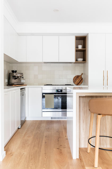 Does your kitchen look this good?  Well it can! From dated and disfunctional, to contemporary and organised, we transformed this u-shape kitchen into a bright, fresh, classic style with feature island bench, warm timbers, and playful elements to add subtle texture and personality.  Ready when you are! U Shape Kitchen, Calm Space, Sustainable Interior Design, Shaker Kitchen Cabinets, Kitchen Interior Design, Coastal Interiors Design, Island Bench, Cottage Renovation, Mornington Peninsula